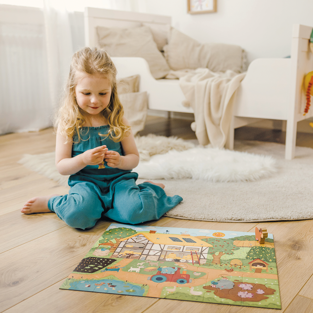 Happy Barn Farm Story Puzzle lifestyle image with child