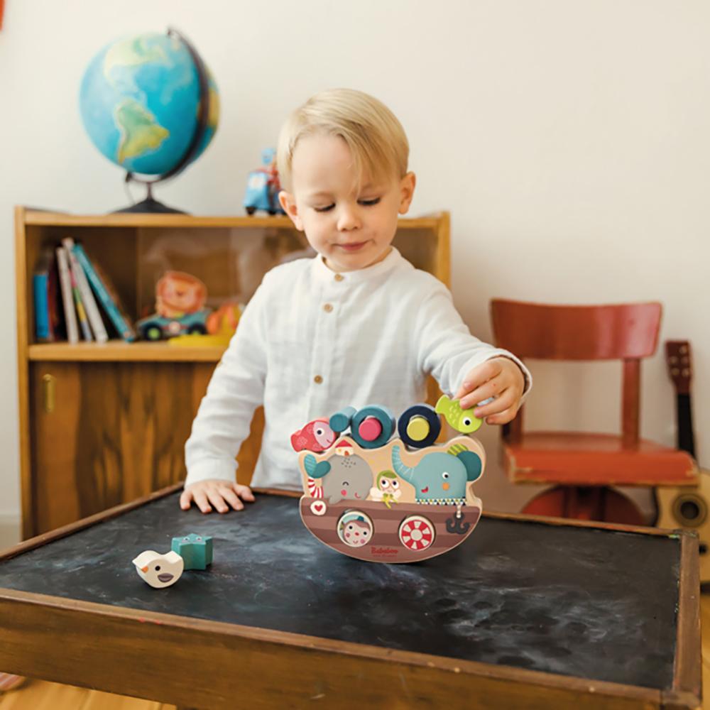 Friends on Board Balancing Game lifestyle image with child